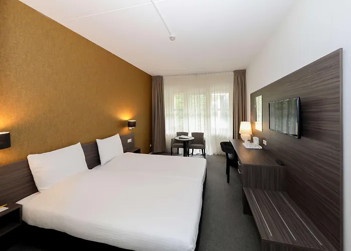 호텔 Golden Tulip Ampt 4*